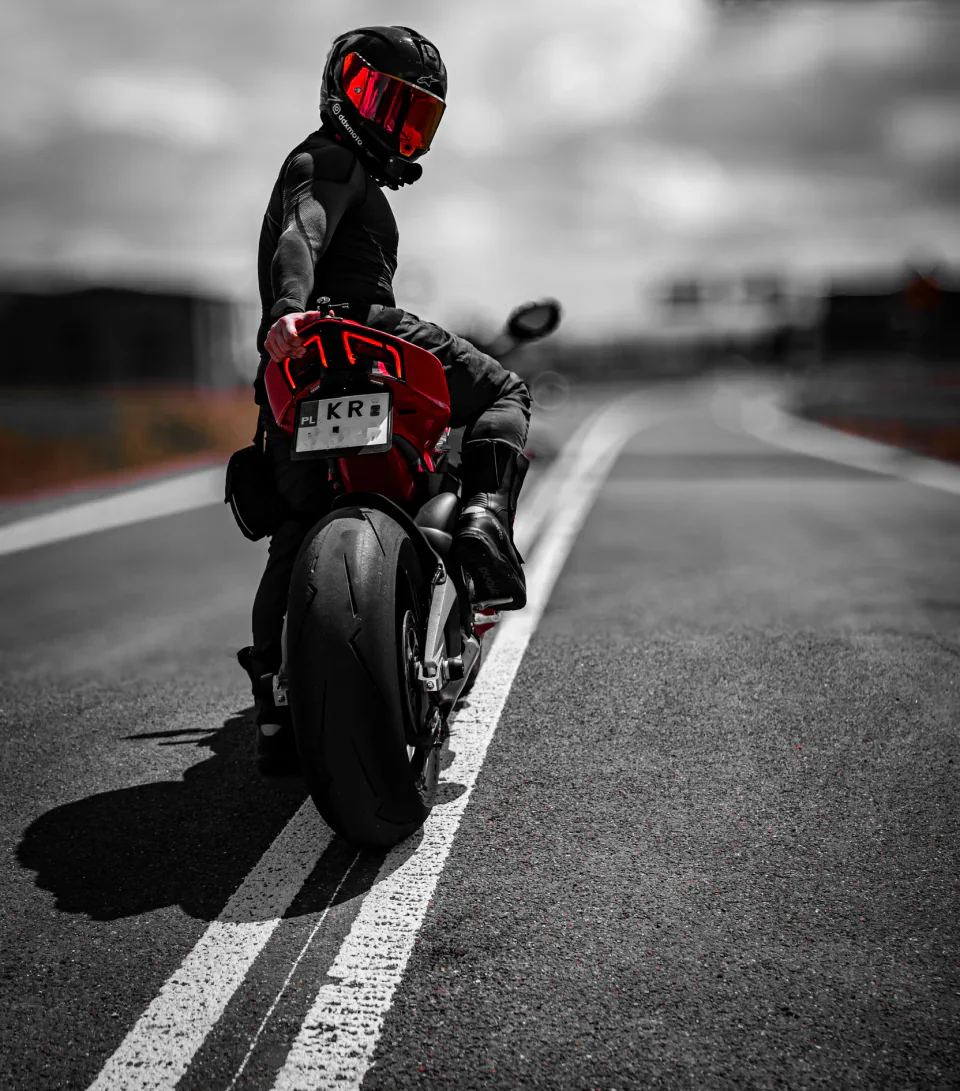 DDXMoto stopped with a sport motorcycle on an open road